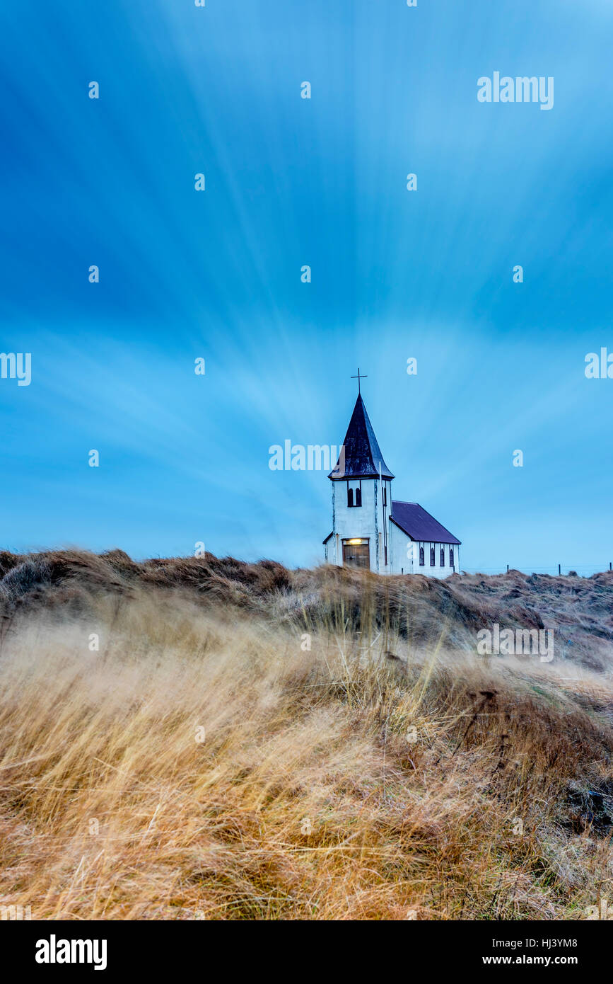 An old church in a remote countryside in Iceland during a rainy, stormy morning Stock Photo