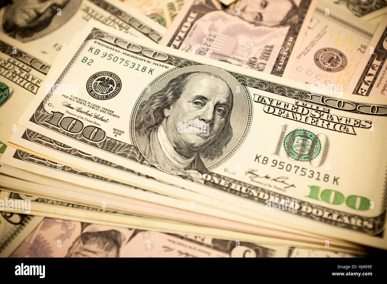 One hundred dollars bills background Stock Photo - Alamy