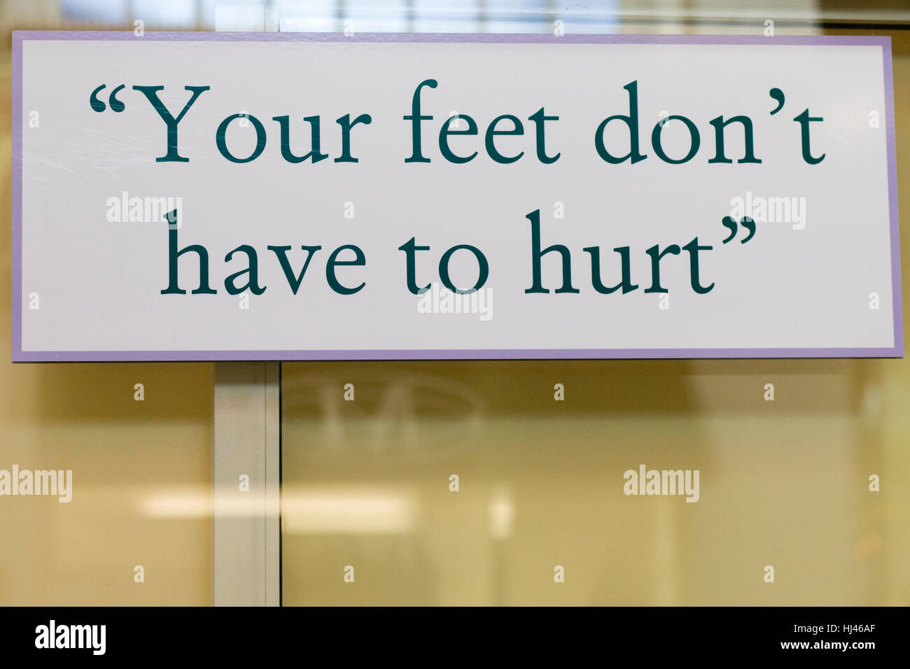 information sign, 'your feet don't have to hurt' Stock Photo