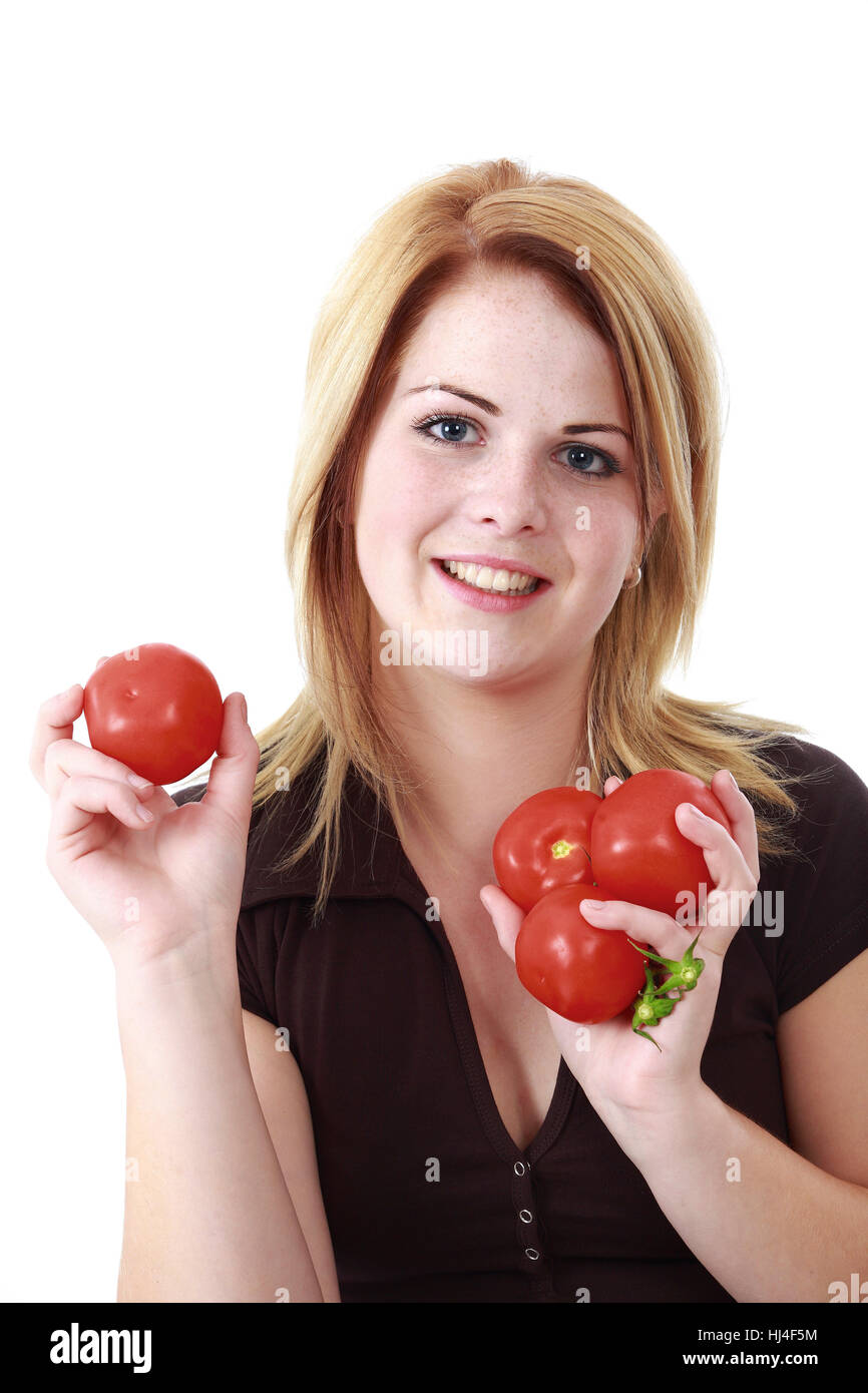 Woman is holding tomatoes Stock Photo - Alamy