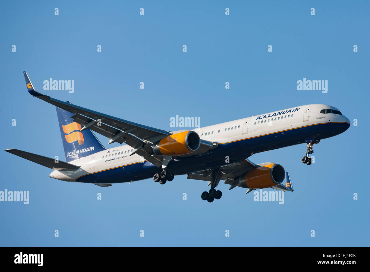 Icelandair Airliner in flight, airplane, plane, blue sky Stock Photo