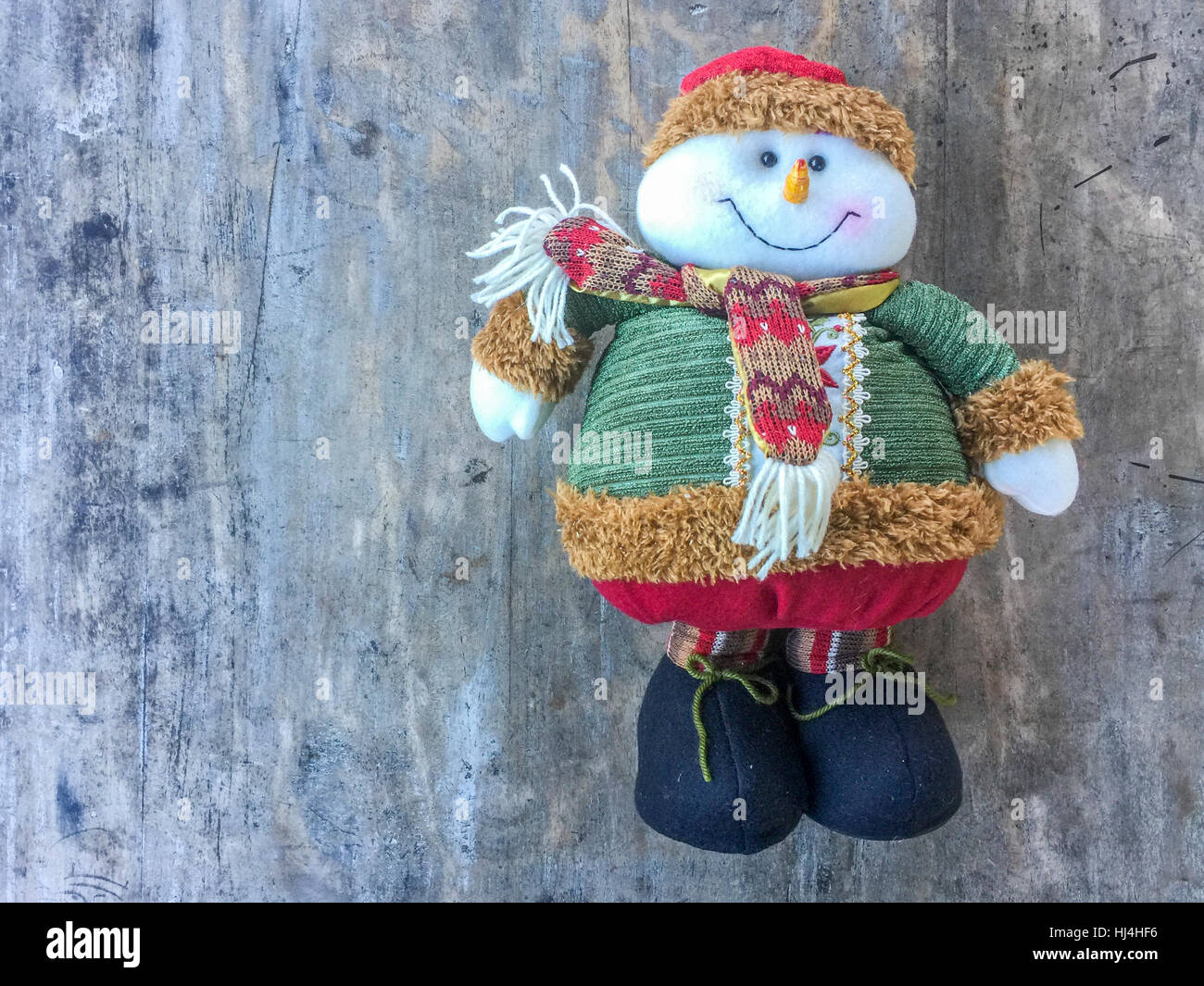 Christmast toys hanging on the wooden wall. Stock Photo
