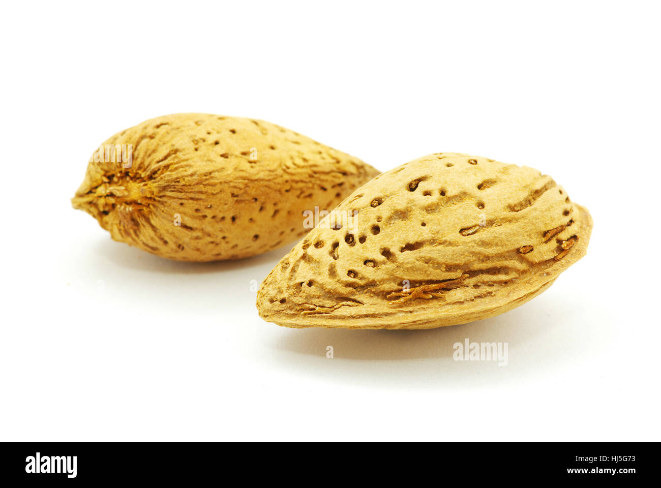 Almond isolated on white background Stock Photo - Alamy