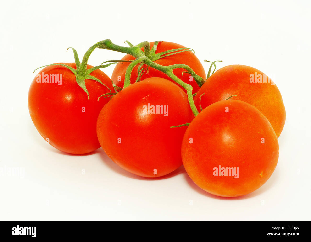 Fresh tomatoes isolated on white background Stock Photo - Alamy