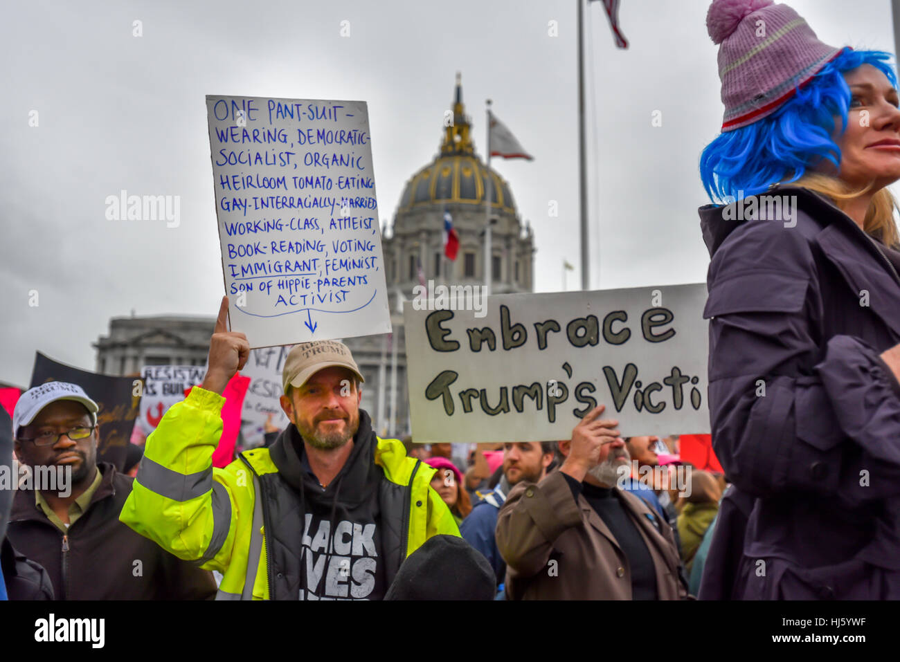 San Francisco, California, USA. 21st January, 2017. Protestors at San Francisco Women's March 2017, holding signs about wearing pant suits, being gay, and generally San Franciscan. Credit: Shelly Rivoli/Alamy Live News Stock Photo
