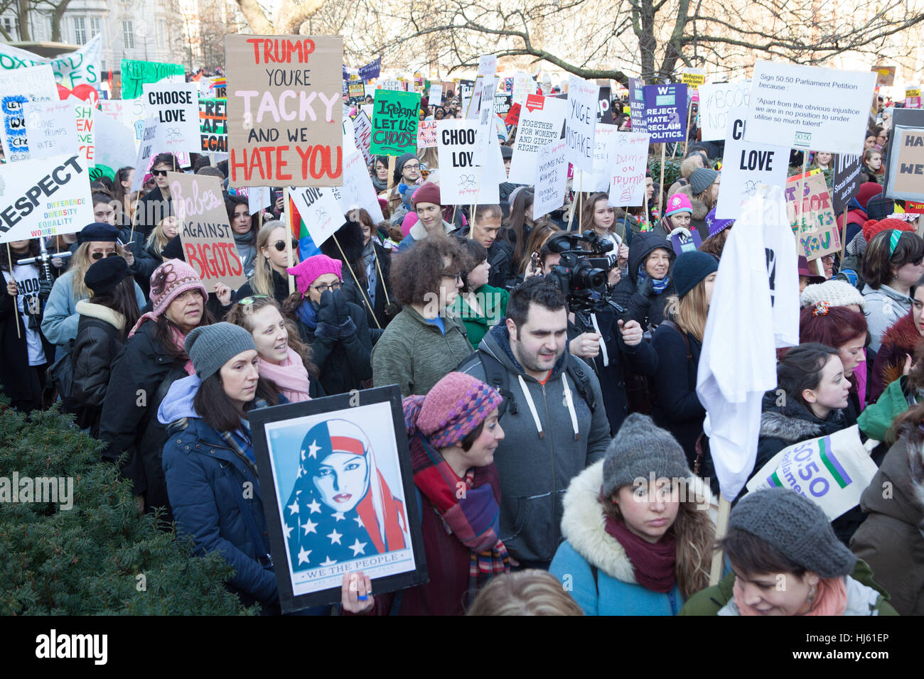 London, UK. 21st January, 2017.Protestors on Women's March marching through streets of London holding placards. Credit: Alan Gignoux/Alamy Live News Stock Photo