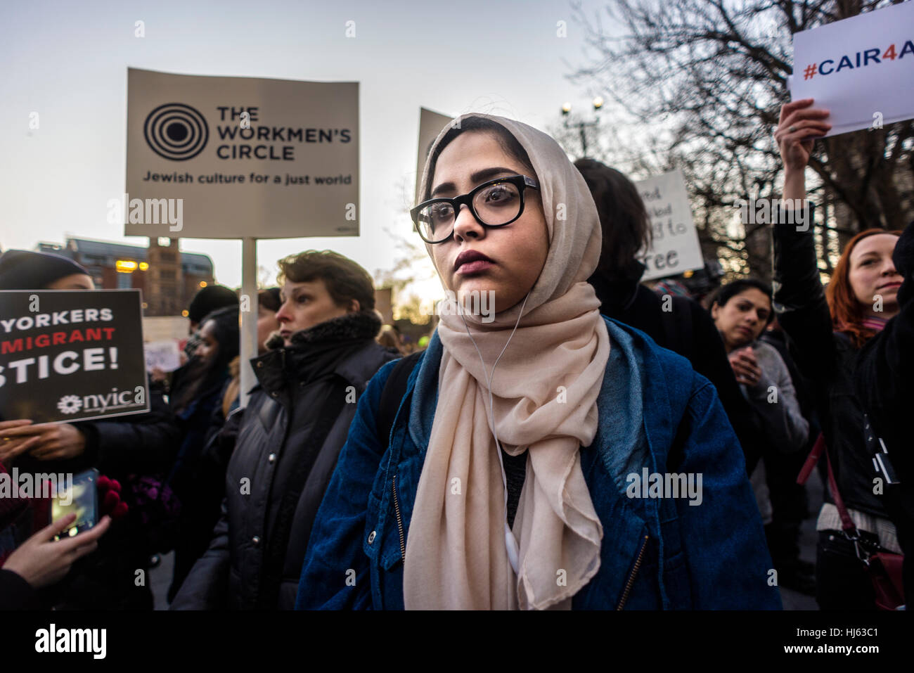 New York, USA. 25th January, 2017. Hours after President Donald Trump signed executive orders to begin building a wall between the US and Mexico, and to increase immigration enforcement, activists rallied in Washington Square Park vowing to defend Muslim and Immigrant rights. Credit: Stacy Walsh Rosenstock / Alamy Live News Stock Photo