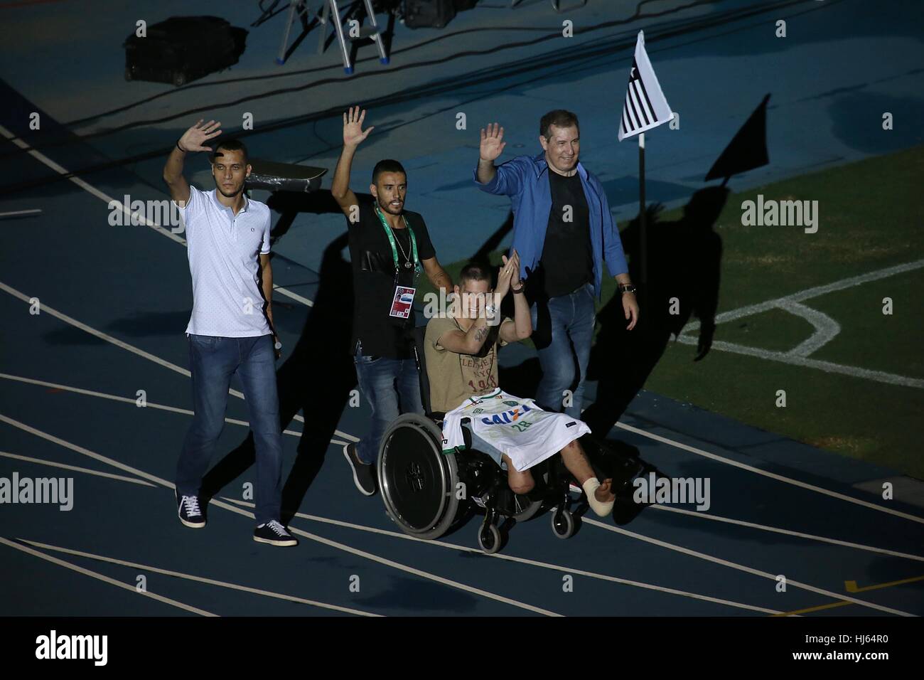 Rio De Janeiro, Brazil. 25th Jan, 2017. Brazilian Chapecoense footballers Alan Ruschel (2nd L), Neto (1st L) and Jackson Follmann (2nd R), and journalist Rafael Henzel (1st R), survivors of the LaMia airplane crash in Colombia, enter the pitch before a friendly match between Brazil and Columbia at the Engenhao Stadium in Rio de Janeiro, Brazil, Jan. 25, 2017. All the net income of the match will be passed on to the Chapecoense Football Association. Credit: Li Ming/Xinhua/Alamy Live News Stock Photo