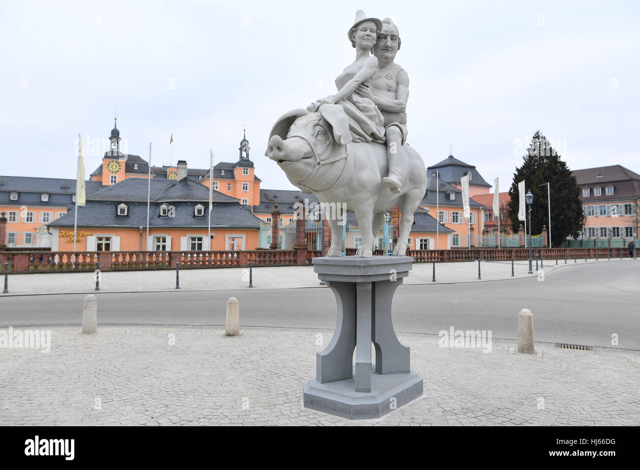 Schwetzingen, Germany. 26th Jan, 2017. The sculpture entitled 'The lucky pig of Schwetzingen' by the artist Peter Lenk that shows Prince Charles Theodore with a mistress outside the entrance to the palace in Schwetzingen, Germany, 26 January 2017. Following a nationwide raid on right-wing extremists, the federal prosecutor's office will decide today whether arrest warrants will be issued. The main suspect is a 66-year-old man from Schwetzingen near Heidelberg. He is close to the 'Reichsbuerger' (Reich citizen) movement. Photo: Uwe Anspach/dpa/Alamy Live News Stock Photo