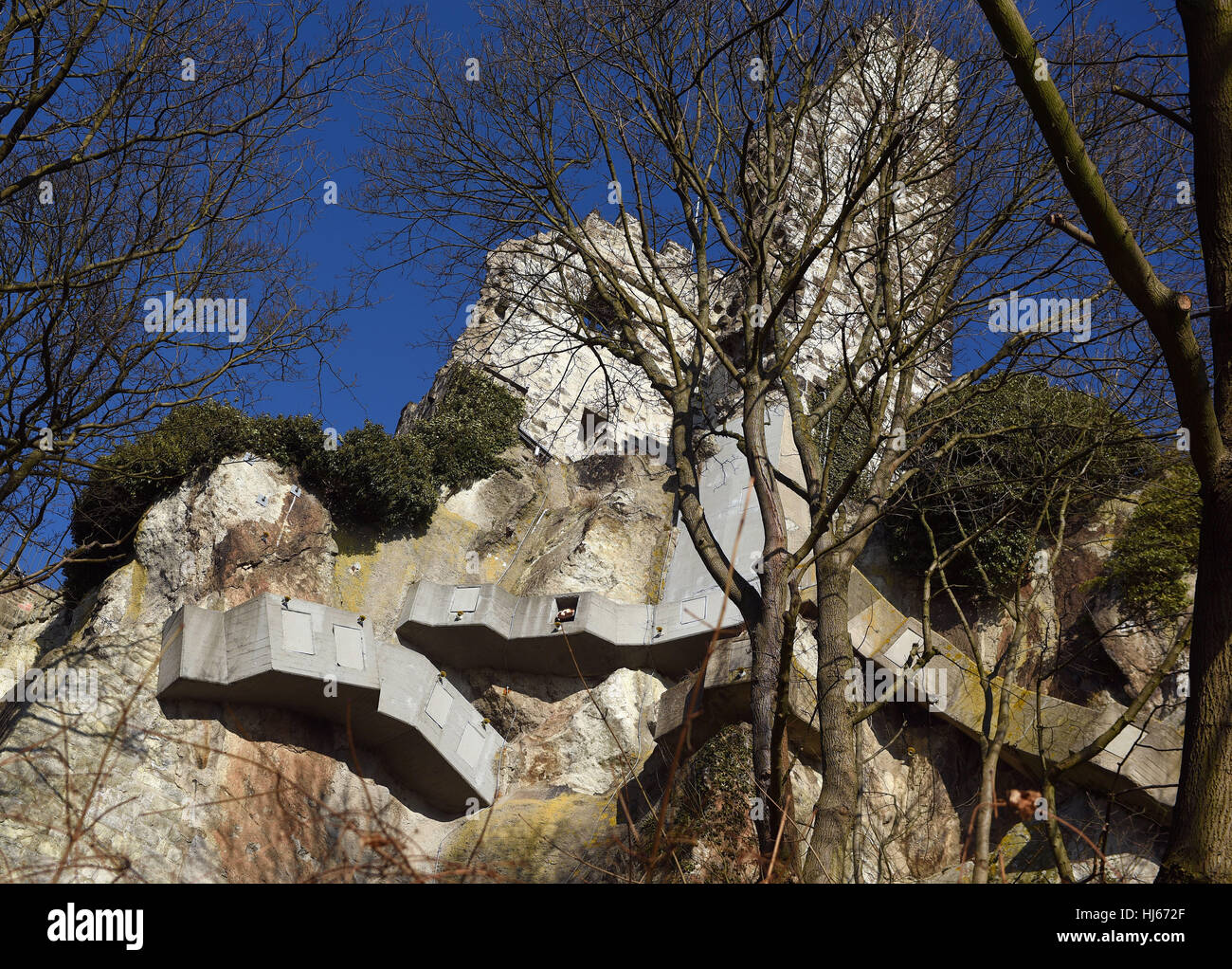Anchors in concrete prevent the rocks from slipping below the bergfried
