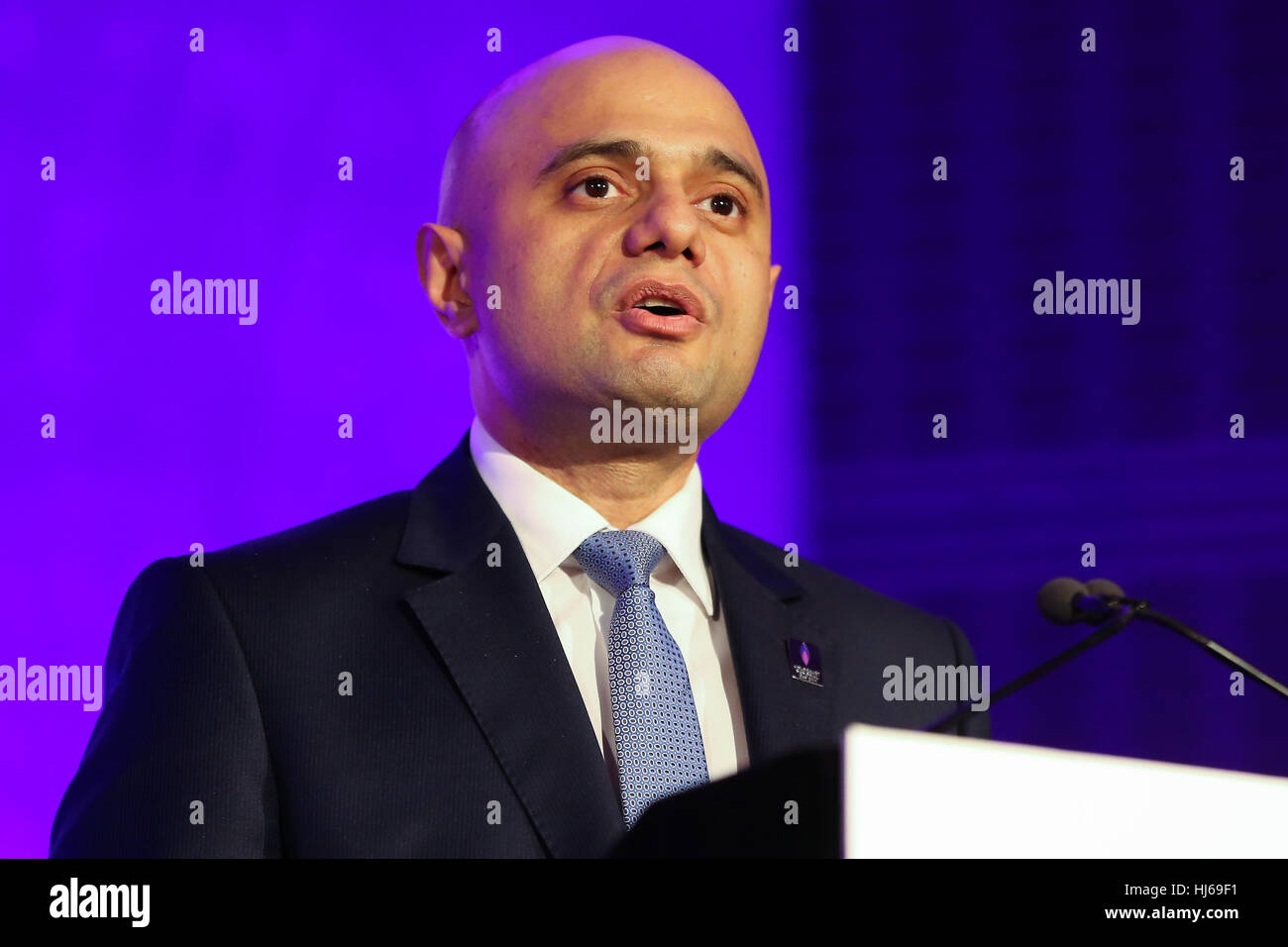 London, UK. 26th Jan, 2017. QEII Conference centre. Communities Secretary of State Sajid Javid. Over 500 people including senior politicians, dignitaries and religious leaders attend Holocaust Memorial Day Service to remember the millions of people murdered in the Holocaust, under Nazi Persecution and in the subsequent genocides in Cambodia, Rwanda, Bosnia and Darfur. 27 January marks the liberation of Auschwitz-Birkenau, the largest Nazi death camp. ‘The theme for Holocaust Memorial Day 2017 is ‘How can life go on?’. Credit: Dinendra Haria/Alamy Live News Stock Photo