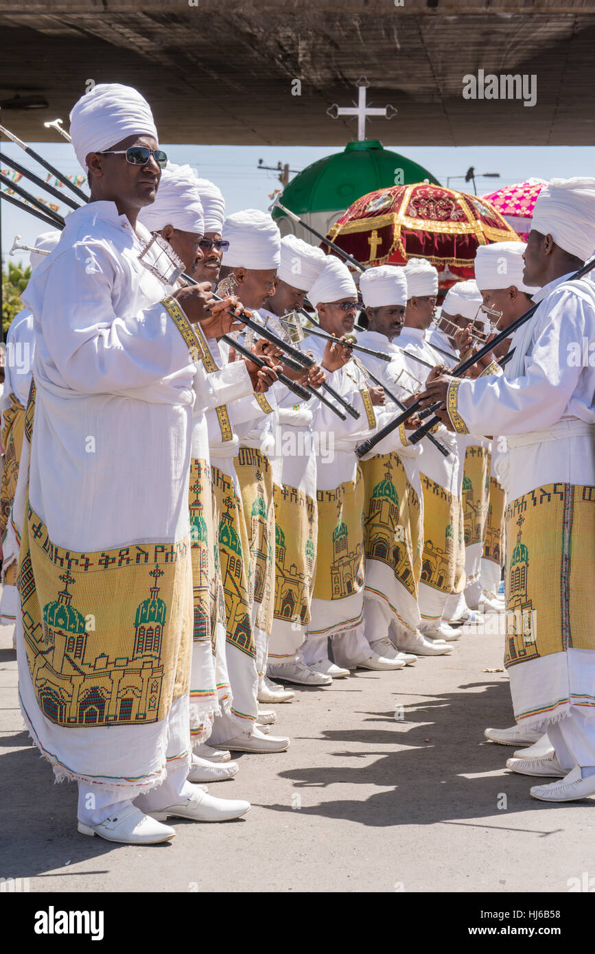 Addis Ababa - Jan 19: Clergymen sing and chant while accompanying the Tabot, a model of the arc of covenant, during a colorful procession which is par Stock Photo