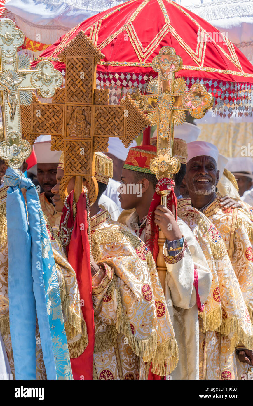 Addis Ababa - Jan 19: Priests wear colorful traditional gowns worn by the Ethiopian Orthodox Clergy, during a Timket procession as part of celebration Stock Photo