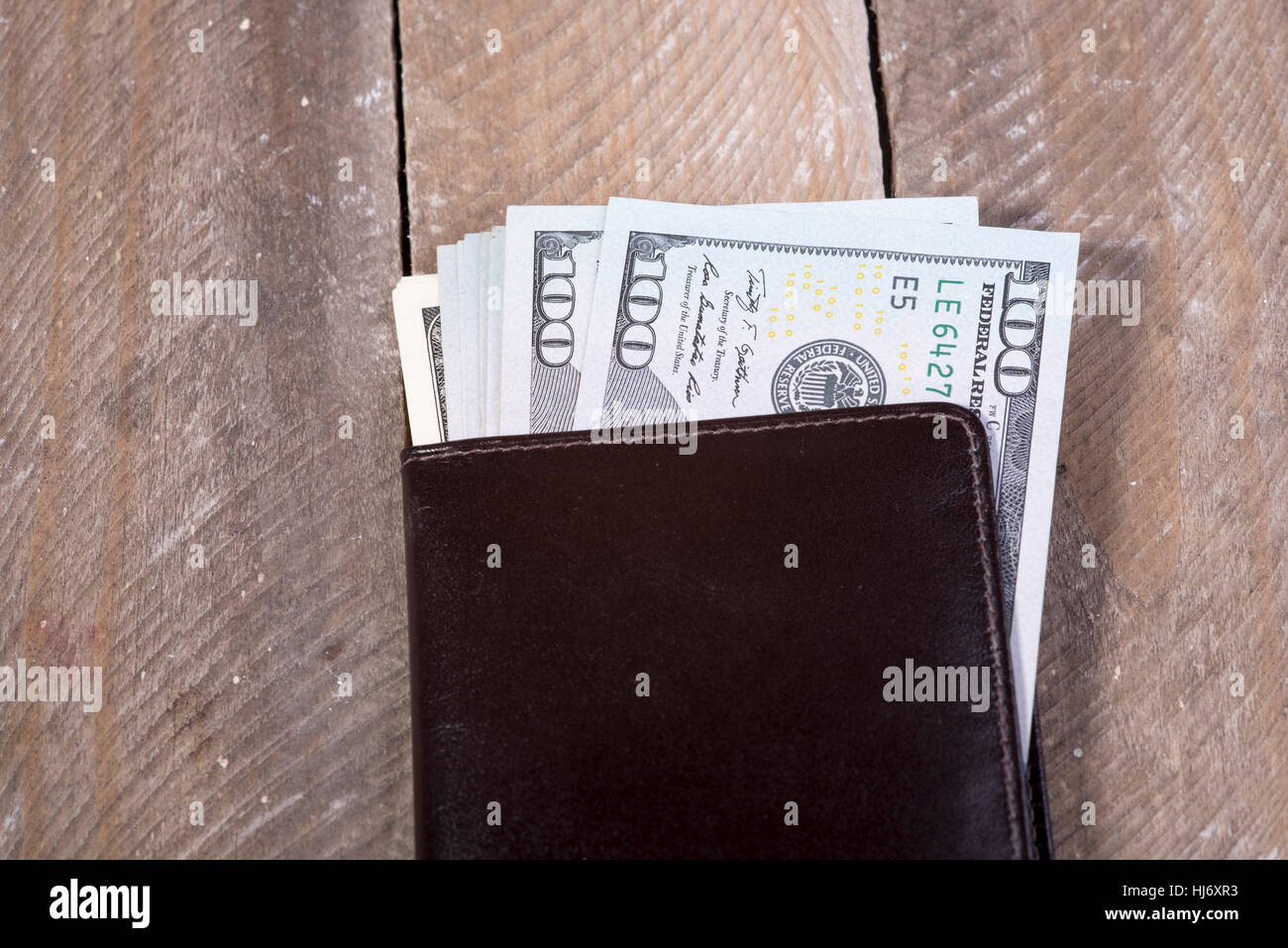 a wallet full of dollars Stock Photo - Alamy