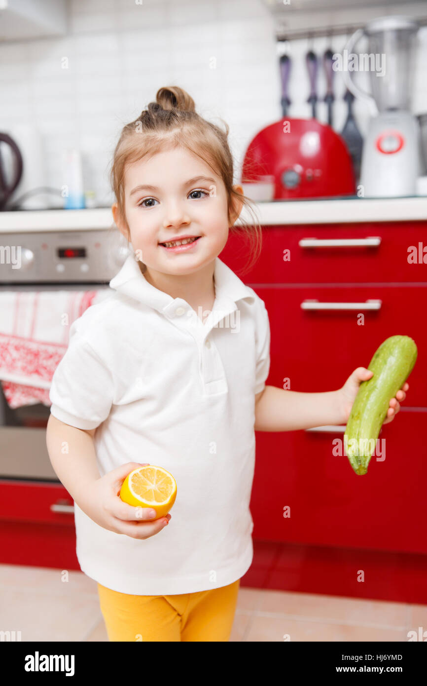 Photography of child with vegetables Stock Photo Alamy