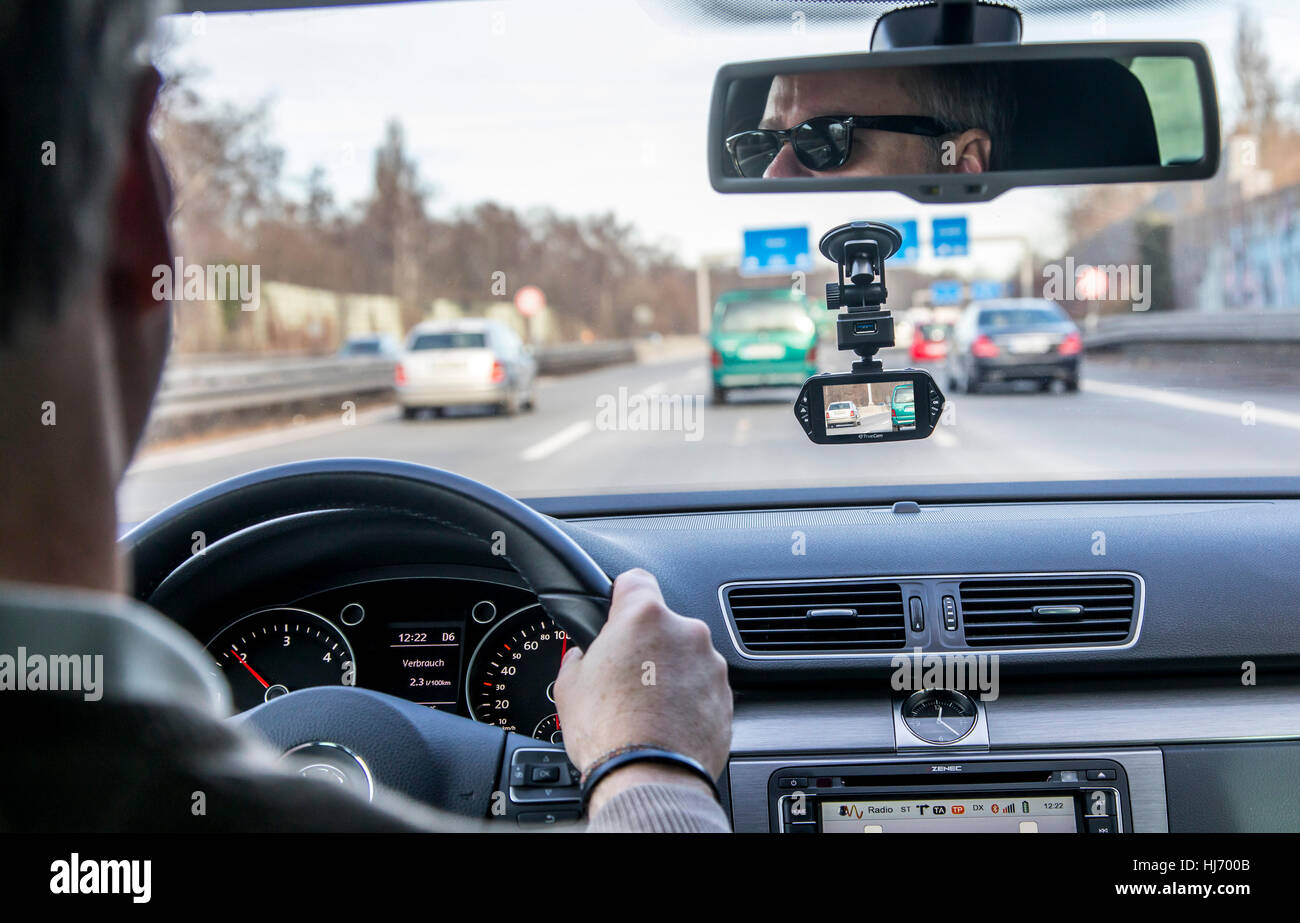 https://c8.alamy.com/comp/HJ700B/dashcam-in-a-passenger-car-video-camera-on-the-windshield-permanently-HJ700B.jpg