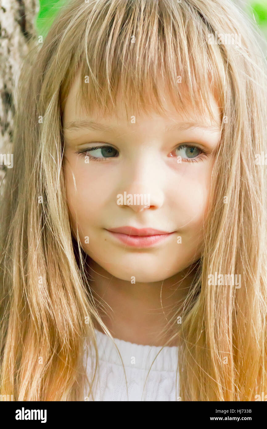 Photo of cute girl with long hair Stock Photo - Alamy