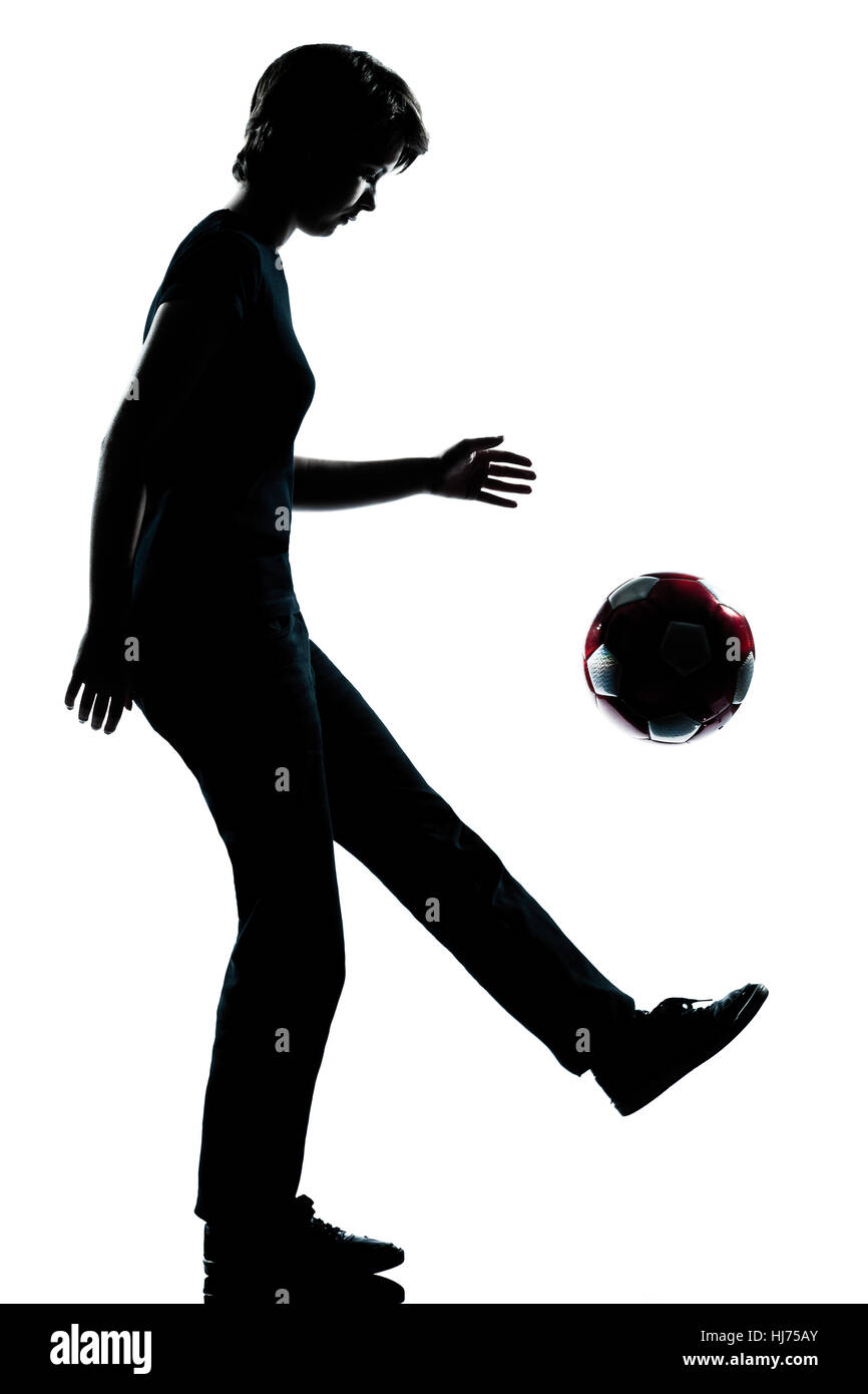 one caucasian young teenager silhouette girl juggling soccer football