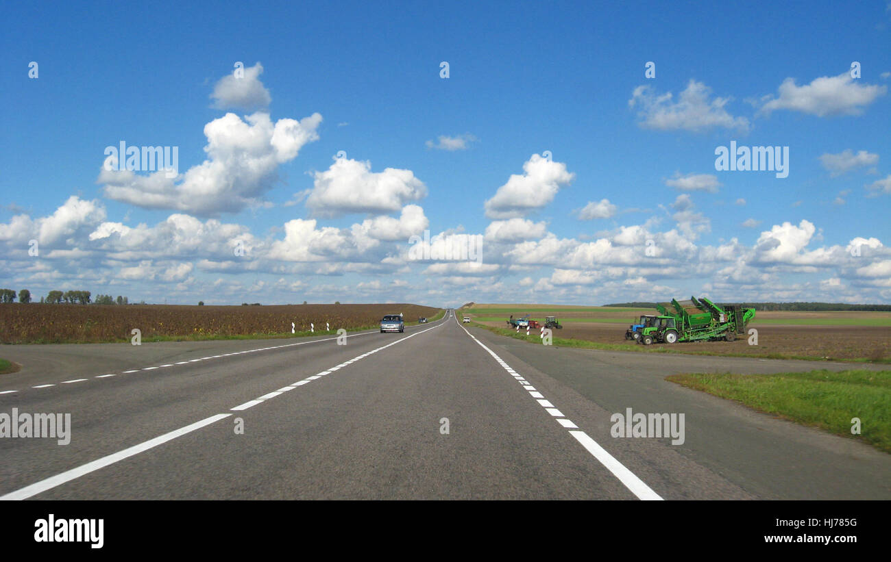 The image of asphalted road and the blue sky Stock Photo - Alamy