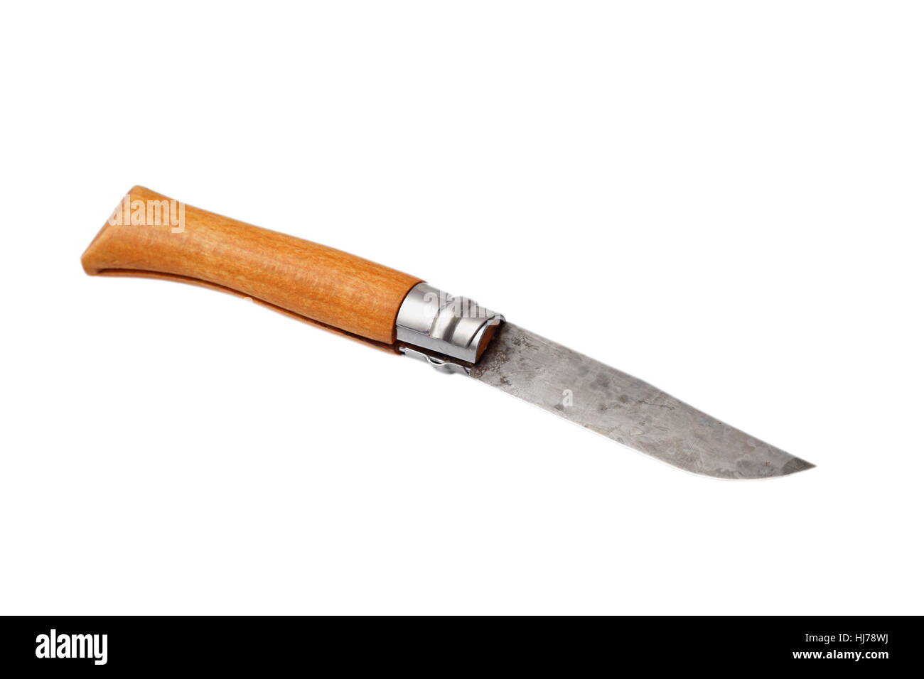 old rusty hunting knife with wooden haft isolated on white background