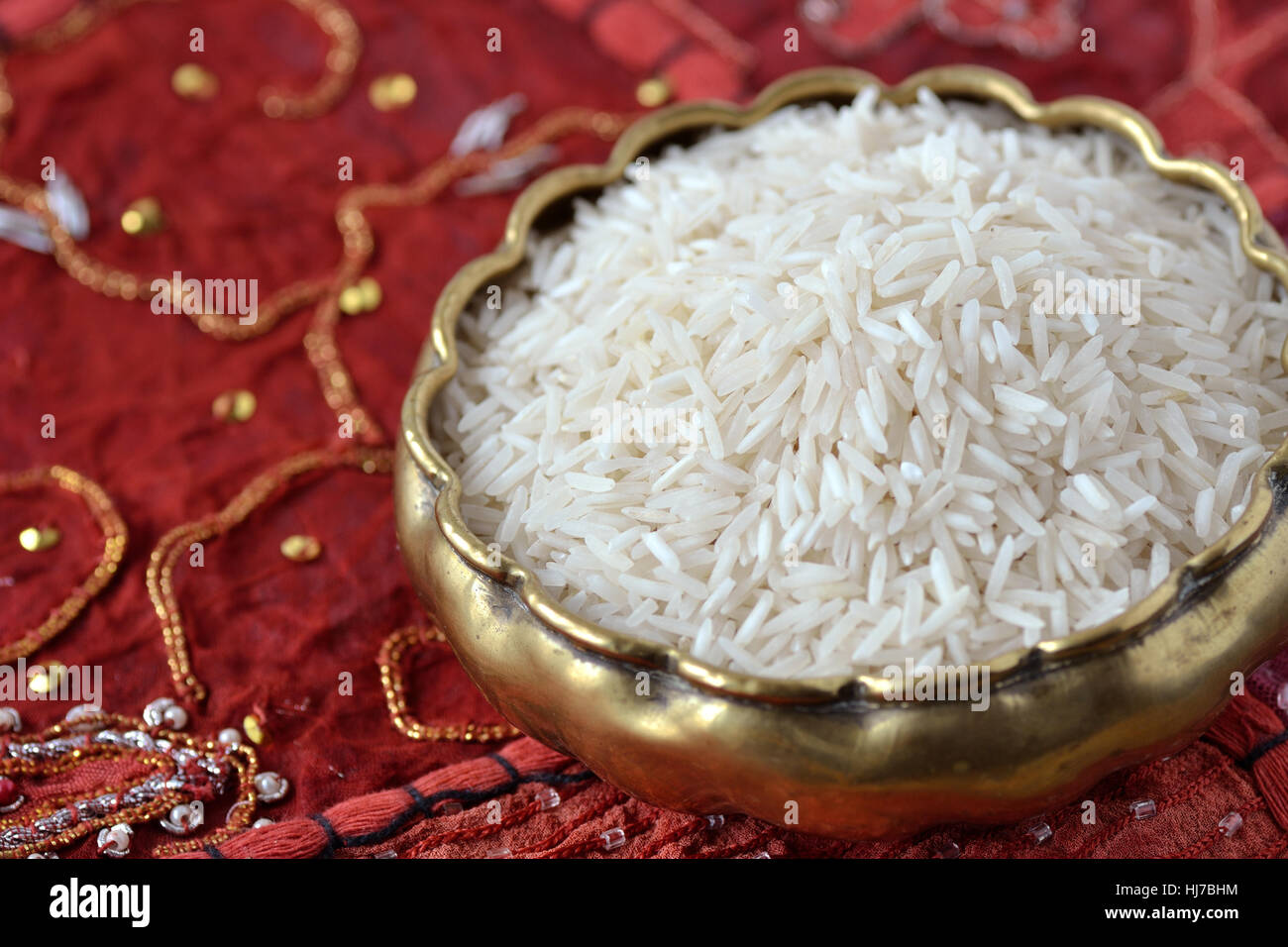 Basmati rice over indian carpet Stock Photo