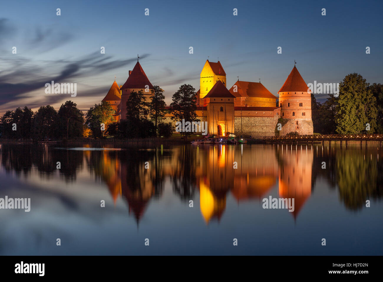 Historic Trakai Island Castle in Lithuania illuminated at night . Stock Photo