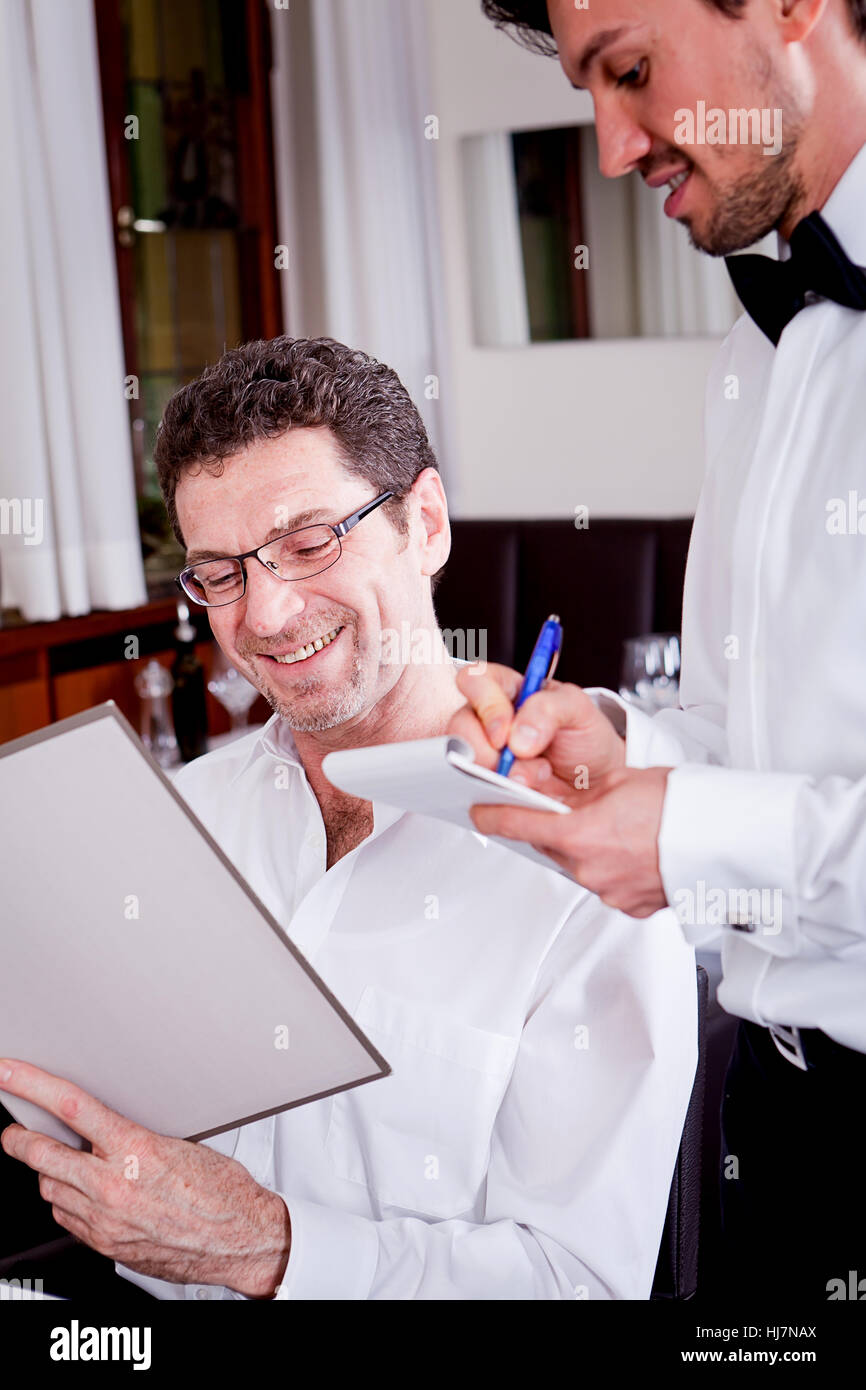 woman and man having dinner in restaurant Stock Photo - Alamy