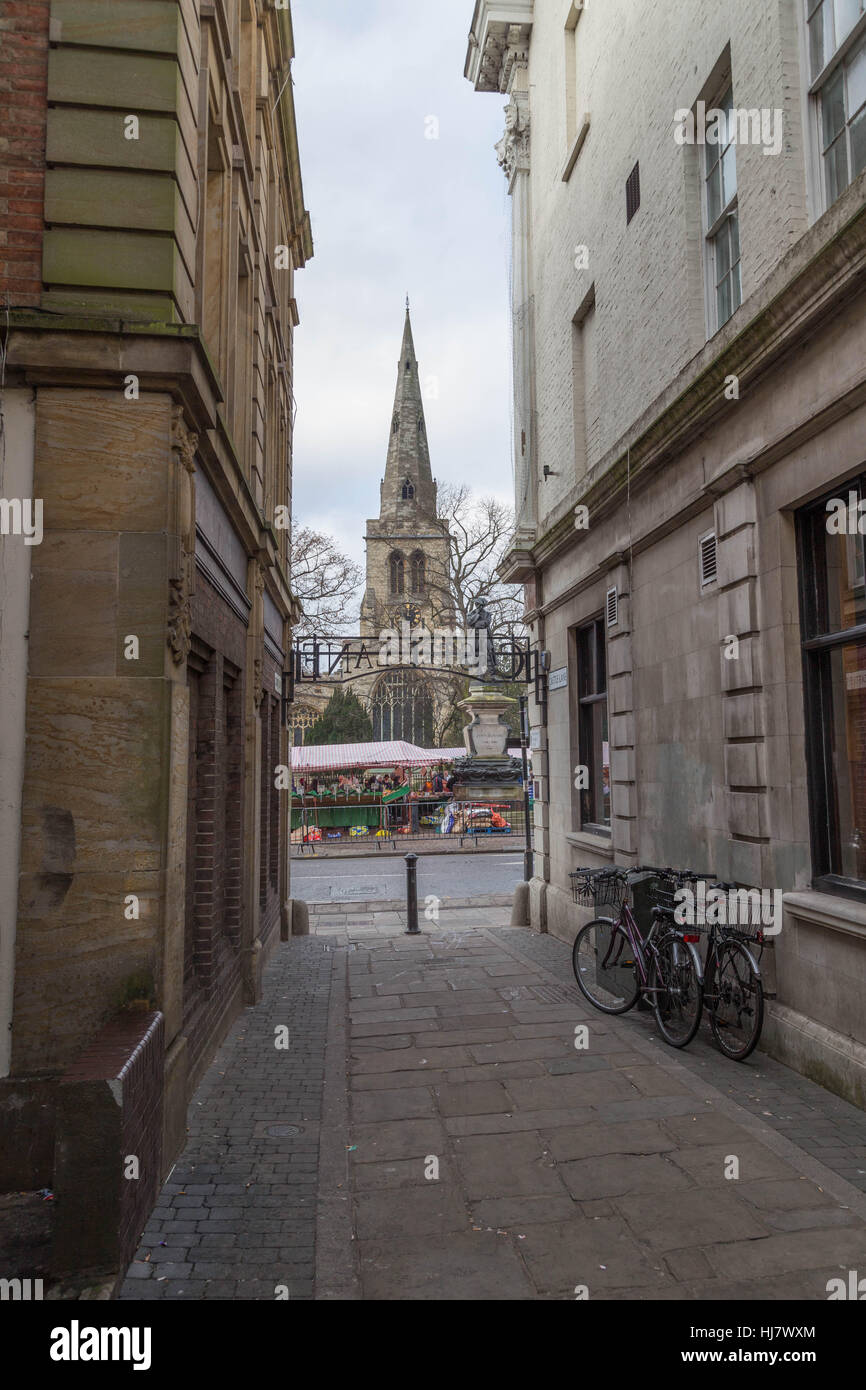 A picture of St Paul's Church in Bedford taken from within a small alley or street. Stock Photo