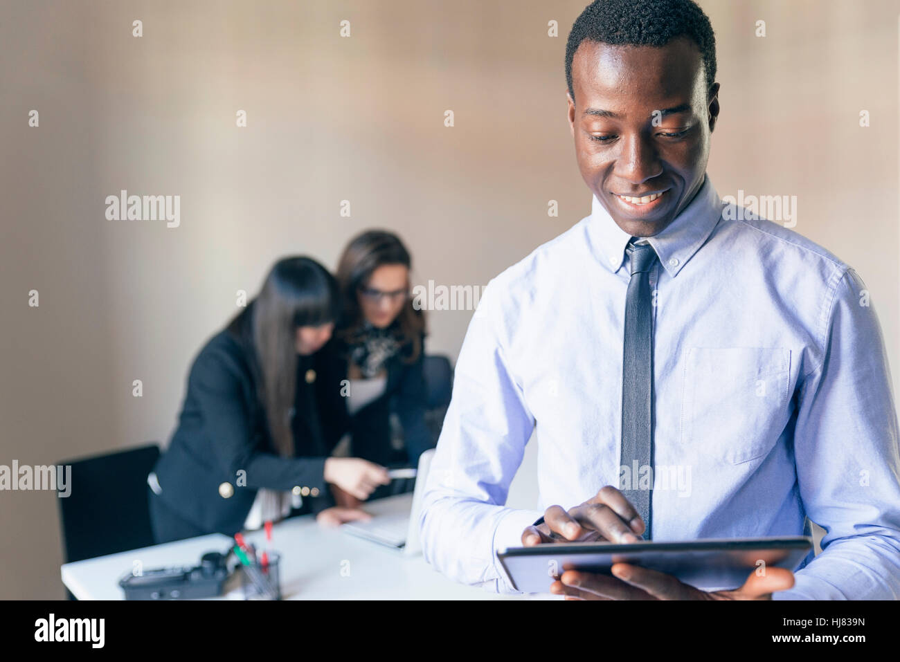 Young Entrepreneurs Working at the Office Stock Photo - Alamy