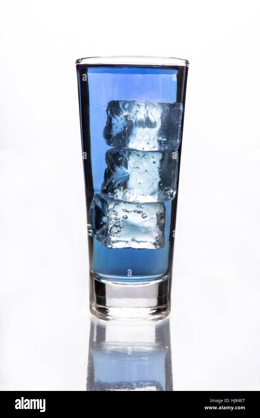 Glass of water with three ice cubes on white background Stock Photo - Alamy