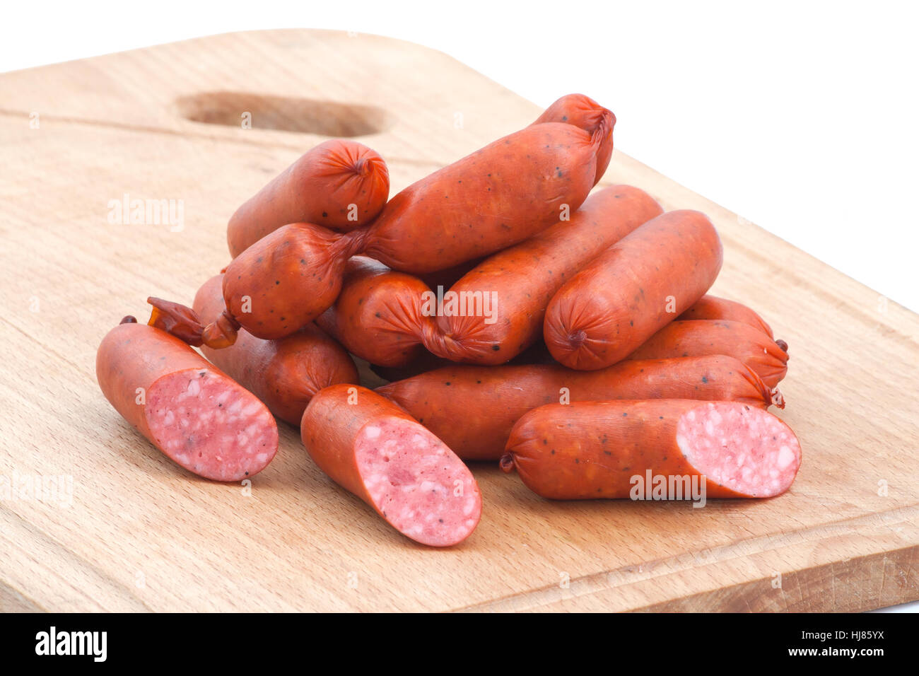 Meat delicatessen on the board isolated on the white Stock Photo