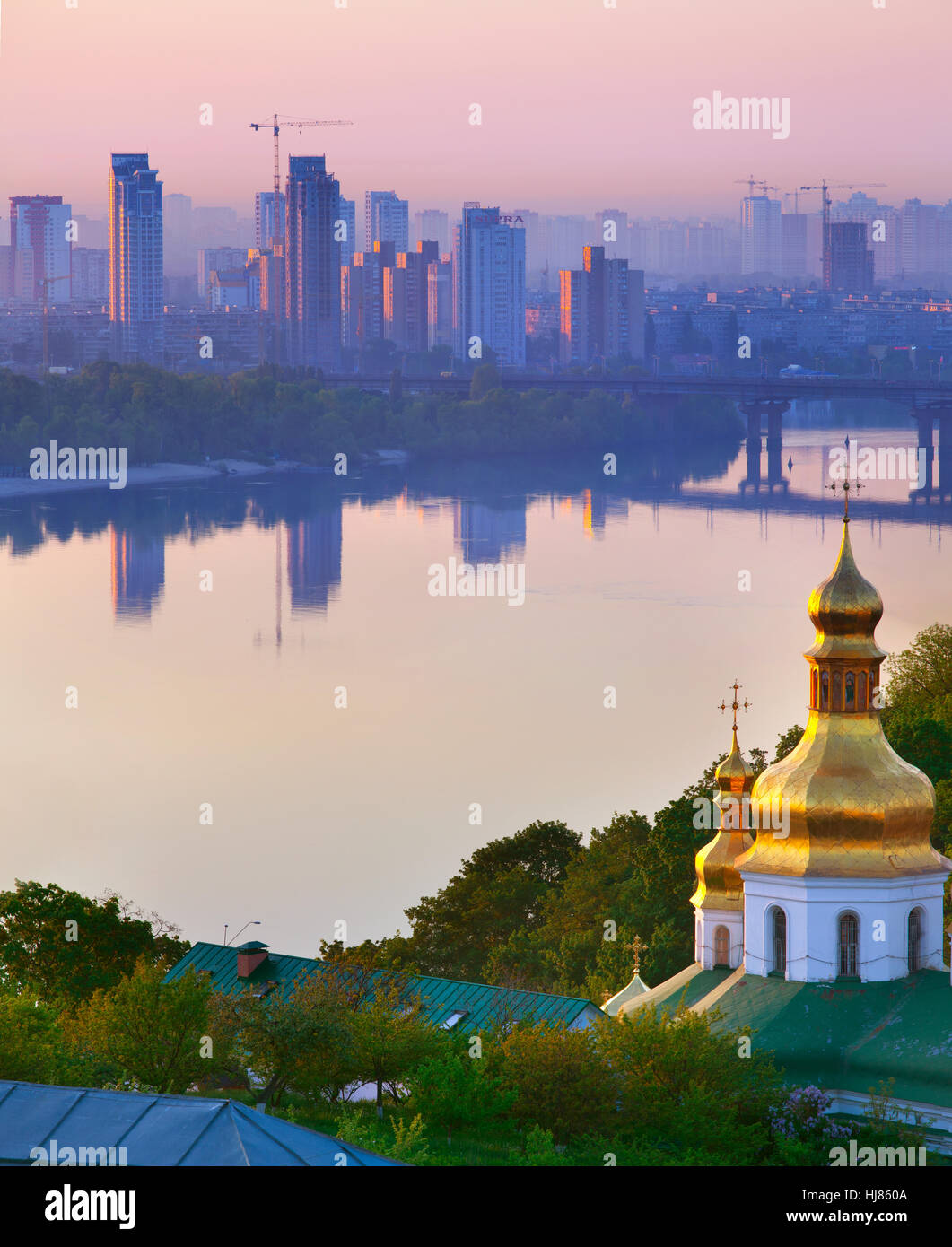 Urban landscape with a church at dawn Stock Photo