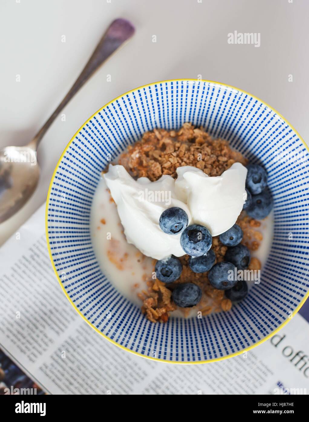 Morning Breakfast Granola Bowl. Yoghurt & Blueberries Stock Photo