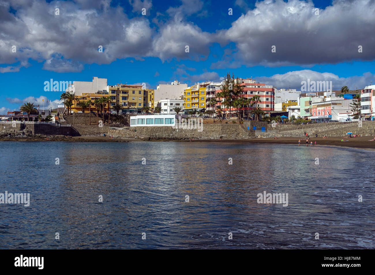 Arguineguin bay beach and blue sky, holiday destination, Gran Canaria Stock Photo