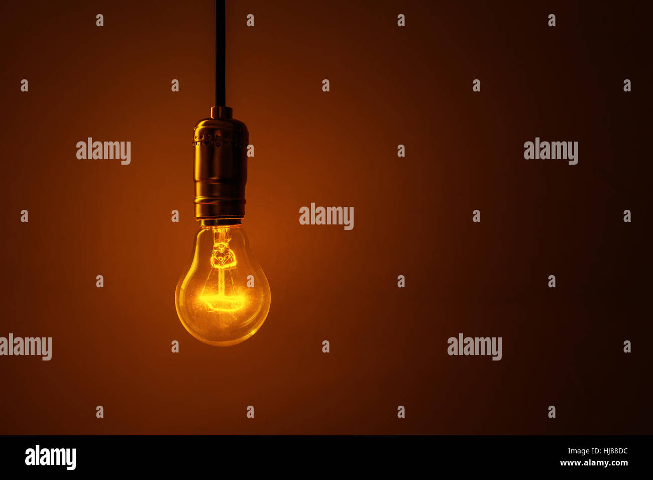 light bulb on dark background Stock Photo - Alamy