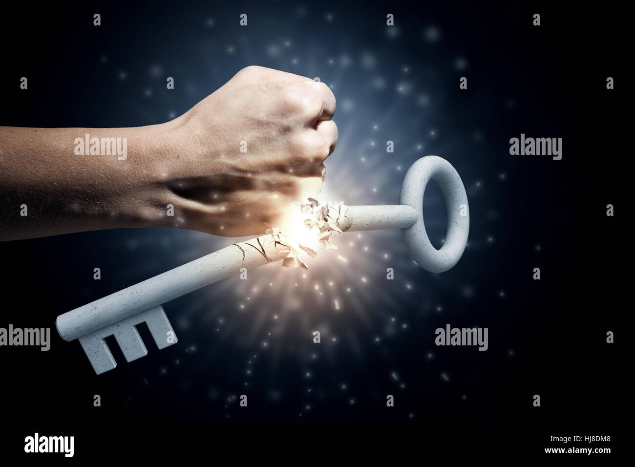 Hand of man crashing key with punch Stock Photo - Alamy
