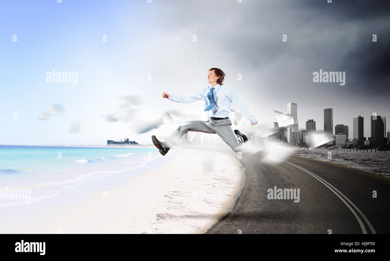 Run From Work Image of businessman running away from office work Stock Photo - Alamy