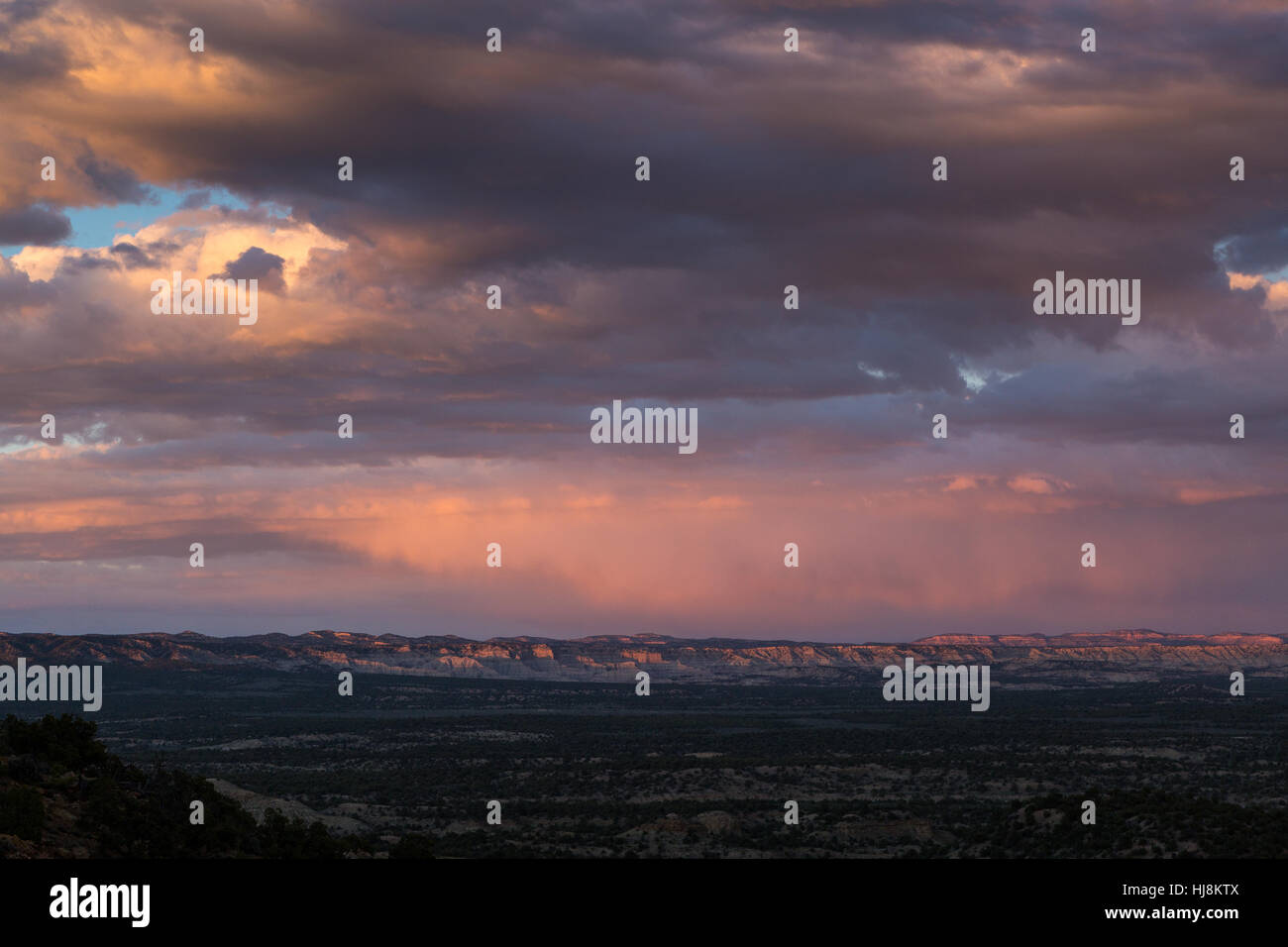 Stormy weather building over the Kaiparowits Plateau at sunset. Grand