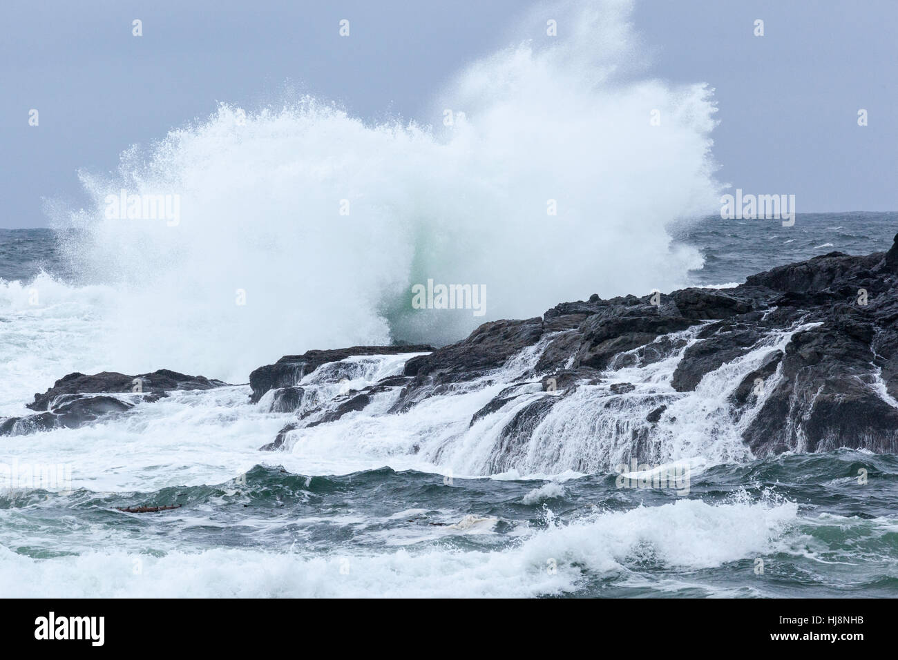 Waves crashing on rocks, Ucluelet, British Columbia, Canada Stock Photo