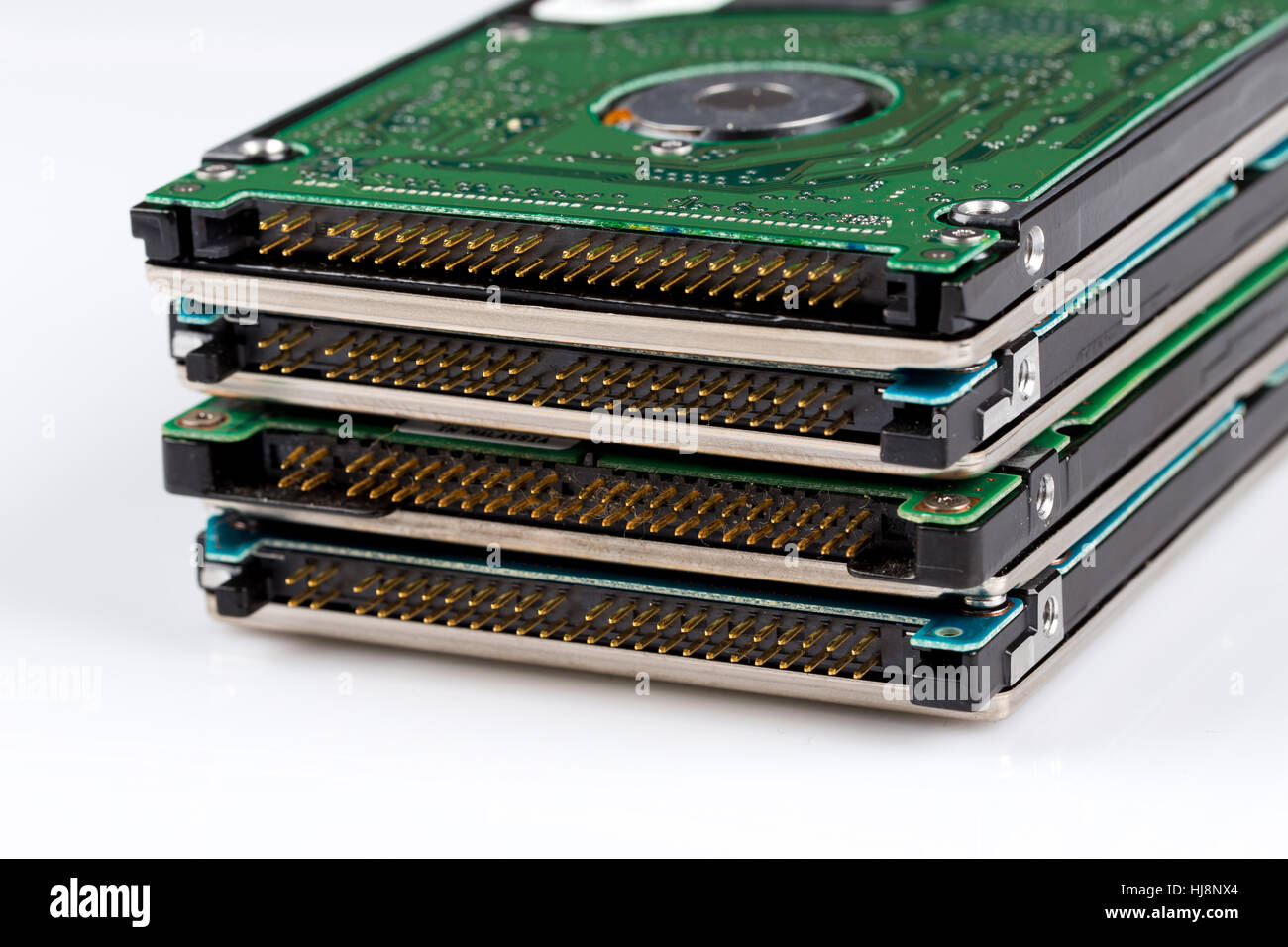 electronic scrap hard drive isolated on white background Stock Photo