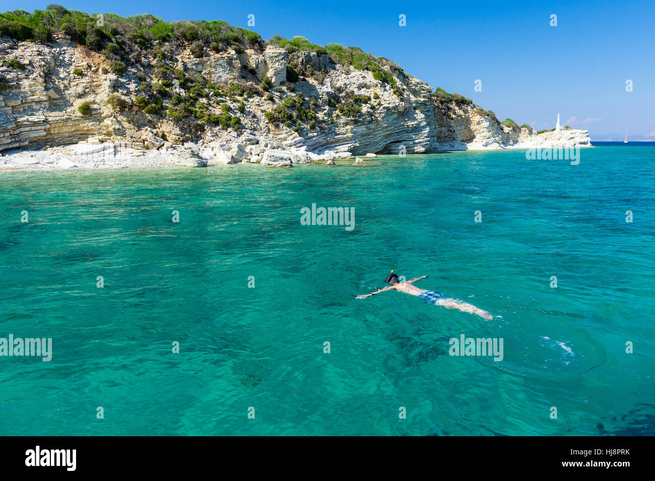 Man snorkeling in Ionian Sea, Lefkada, Greece Stock Photo