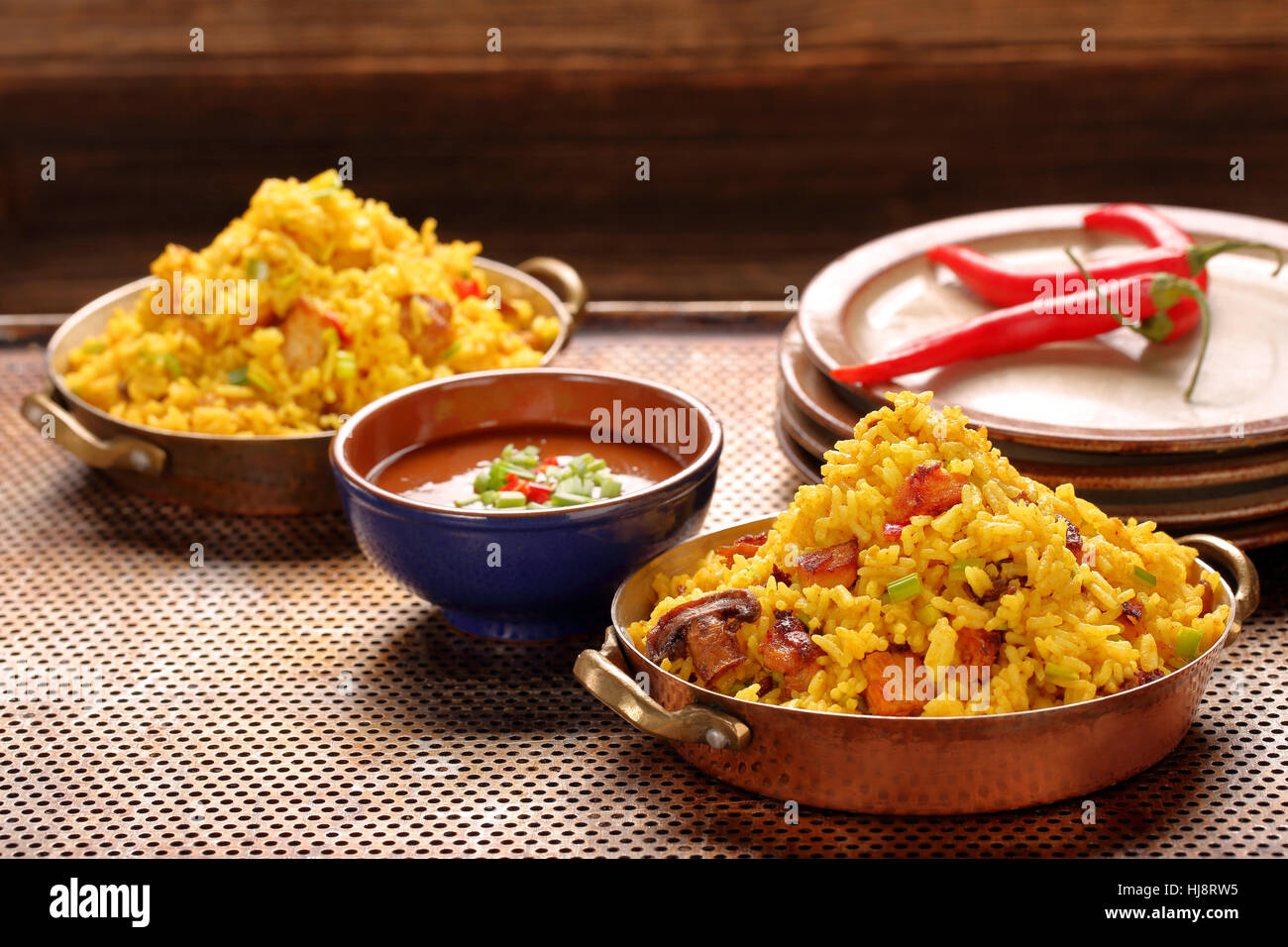 Chicken with basmati rice fried in stainless pan Stock Photo Alamy