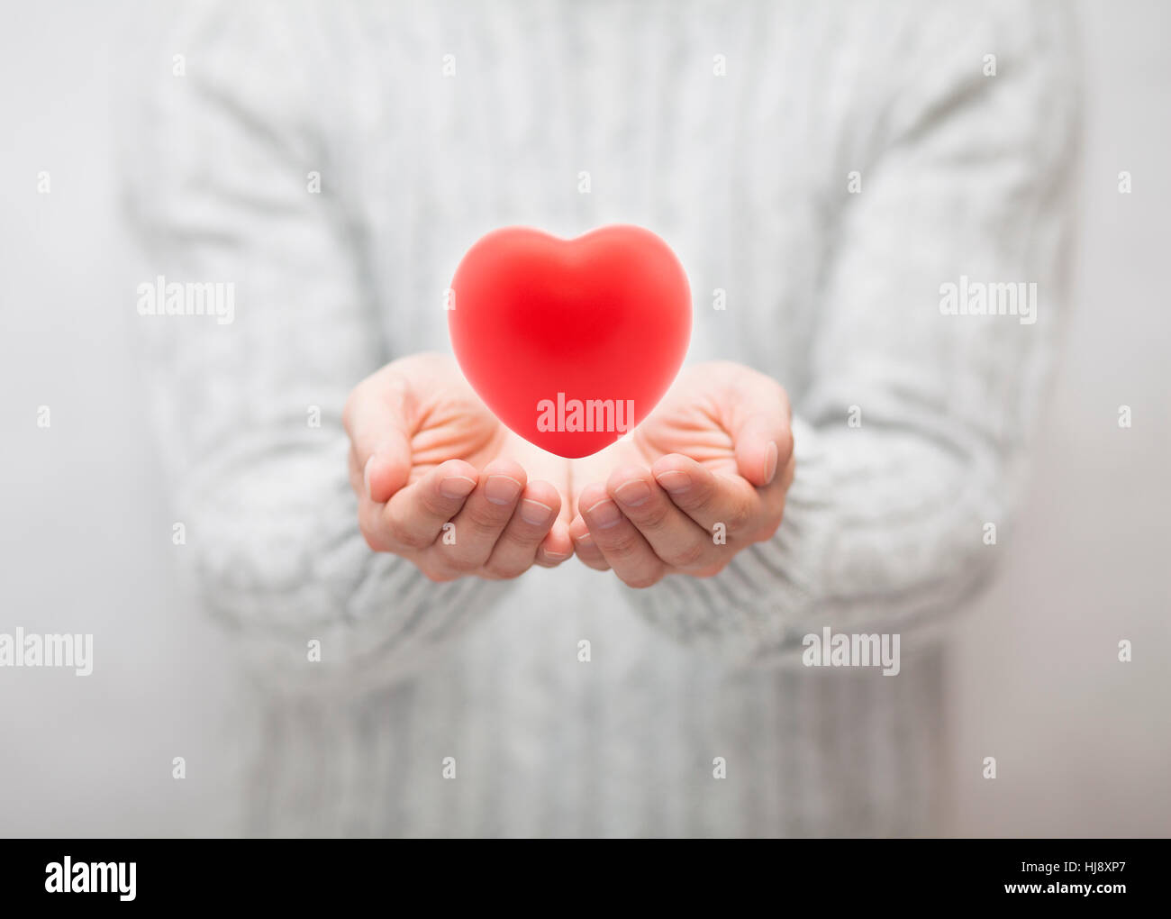 Man giving red heart. Love concept Stock Photo
