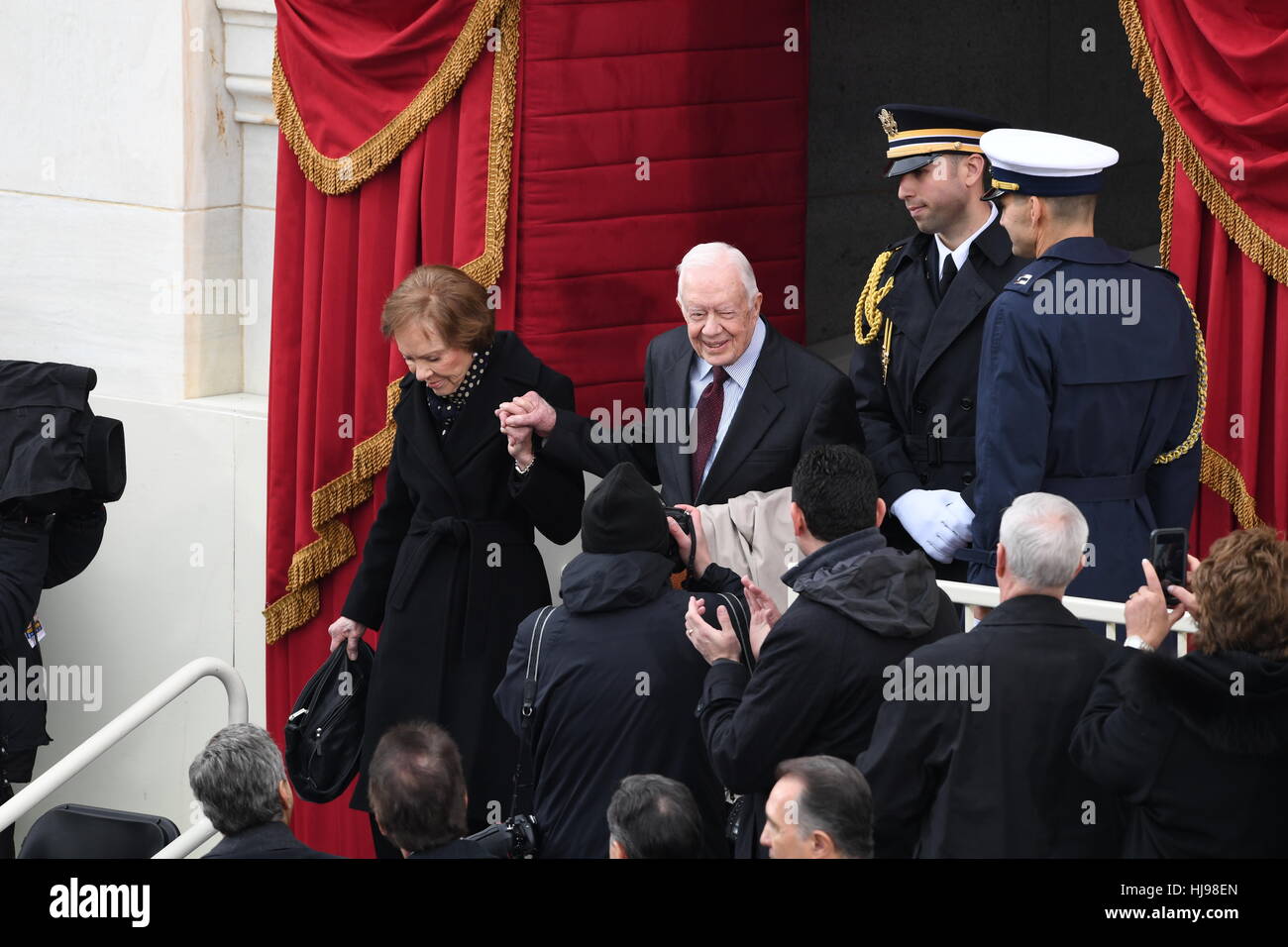 Former President Jimmy Carter and wife Rosalynn Carter arrive for the President Inaugural Ceremony on Capitol Hill January 20, 2017 in Washington, DC. Donald Trump became the 45th President of the United States in the ceremony. Stock Photo