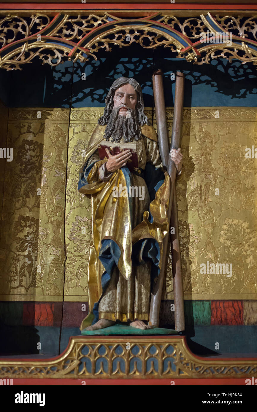 Saint Andrew the Apostle. Coloured wooden statue in the Gothic altarpiece of Saint Andrew (1512) from Liptoszentandras (now Liptovsky Ondrej, Slovakia) on display in the Hungarian National Gallery (Magyar Nemzeti Galeria) in Budapest, Hungary. Stock Photo