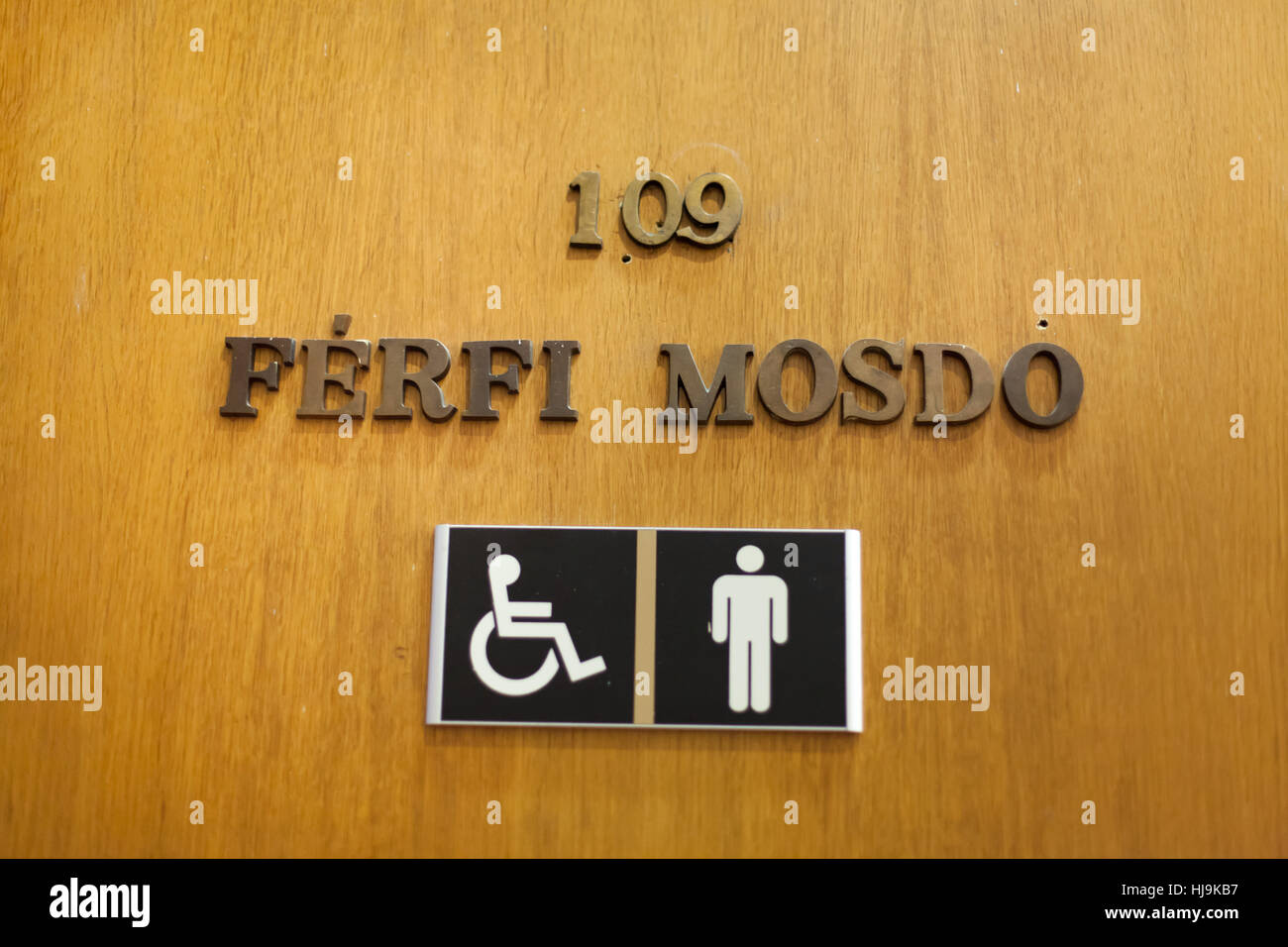Male restroom with an inscription in Hungarian language in the Hungarian National Gallery in Budapest, Hungary. Stock Photo