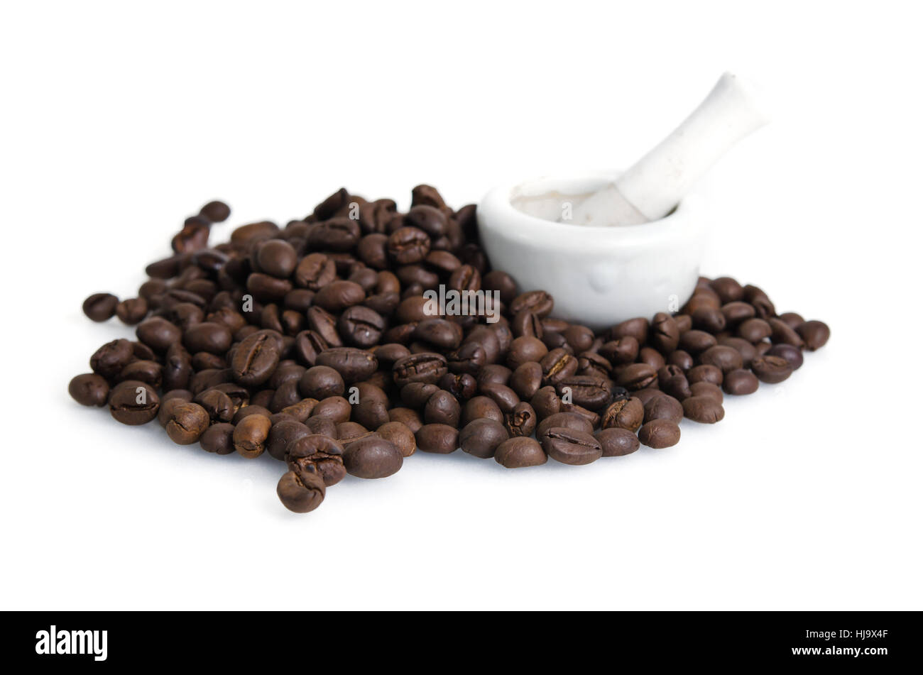 Heap of roasted coffee beans isolated on white Stock Photo - Alamy