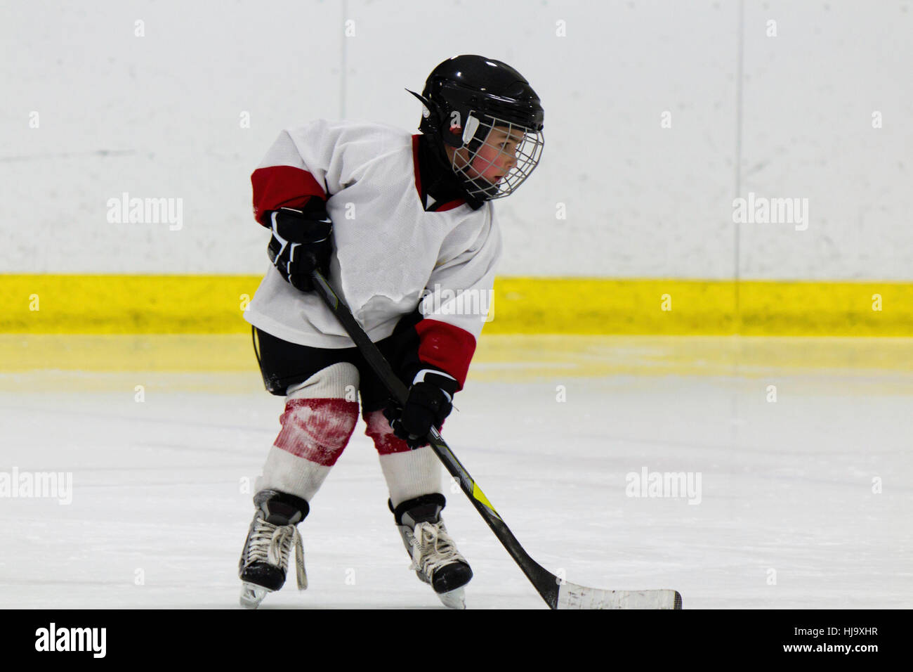 Child playing ice hockey Stock Photo Alamy