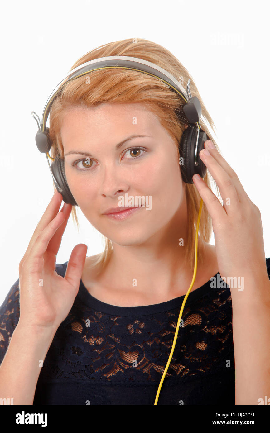 Enjoying music through headphones Stock Photo Alamy