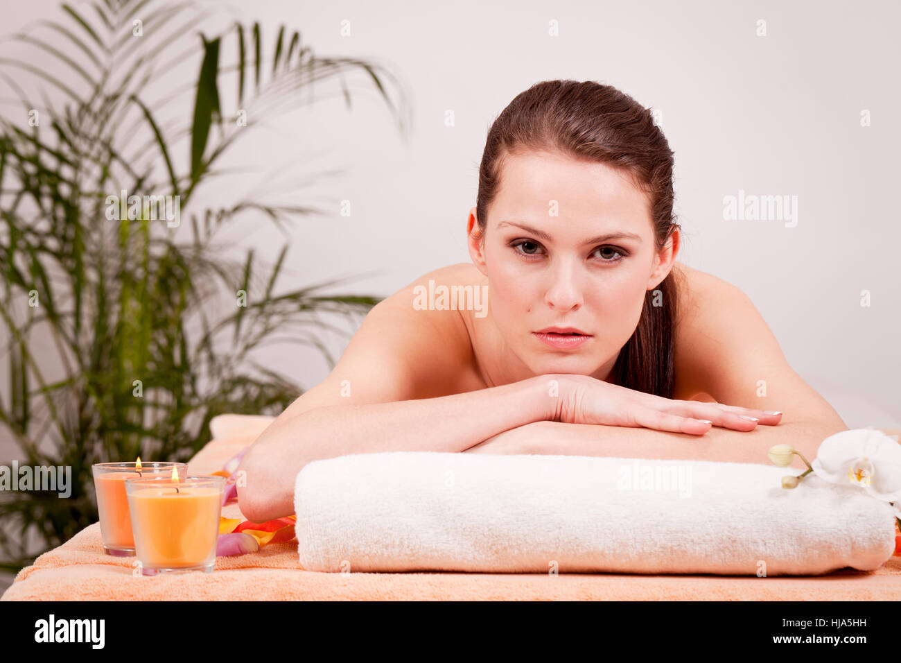 massage young woman with a back neck Stock Photo
